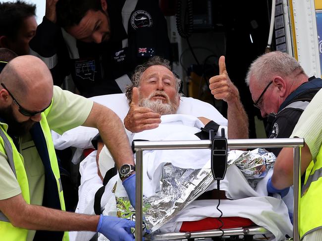 Col Rowland arriving at Newcastle's John Hunter Hospital after the shark attack. Picture: Peter Lorimer