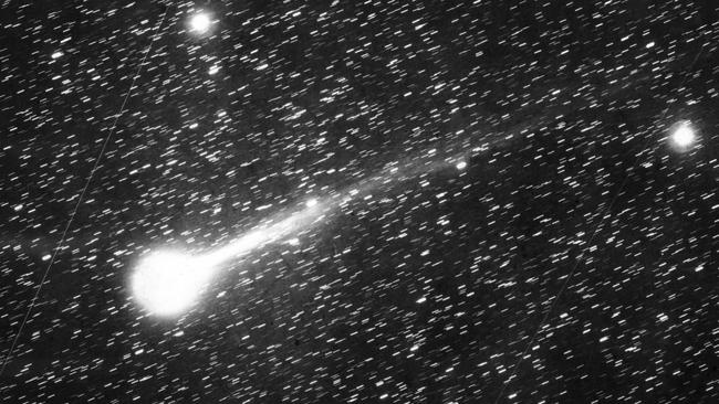  18 December 1985 -- Halley's Comet crosses the sky during its last visit to Earth on its 86-year circuit of the solar system. Picture taken at Siding Spring observatory, Coonabarabran, NSW. Picture: Anglo-Australian Observatory. 