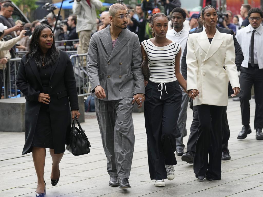 Diddy’s children Quincy Combs, second from left, and Chance Combs centre, arrive at Manhattan federal court. Picture: AP