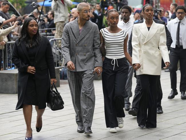 Diddy’s children Quincy Combs, second from left, and Chance Combs centre, arrive at Manhattan federal court. Picture: AP