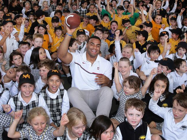 Solomon posing for a giant selfie with the kids. Picture: Virginia Young