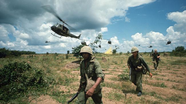 The US 173rd Airborne are supported by helicopters during the Iron Triangle assault in Vietnam.