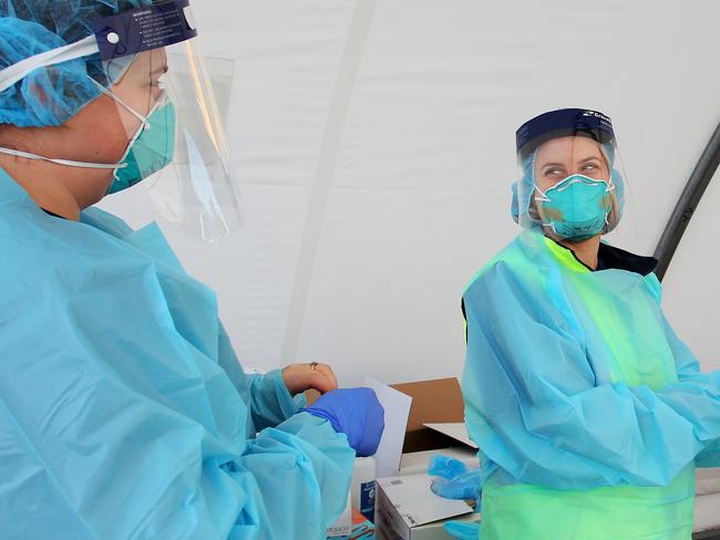 Health workers will continue wearing masks but not the general public. Picture; Getty Images.