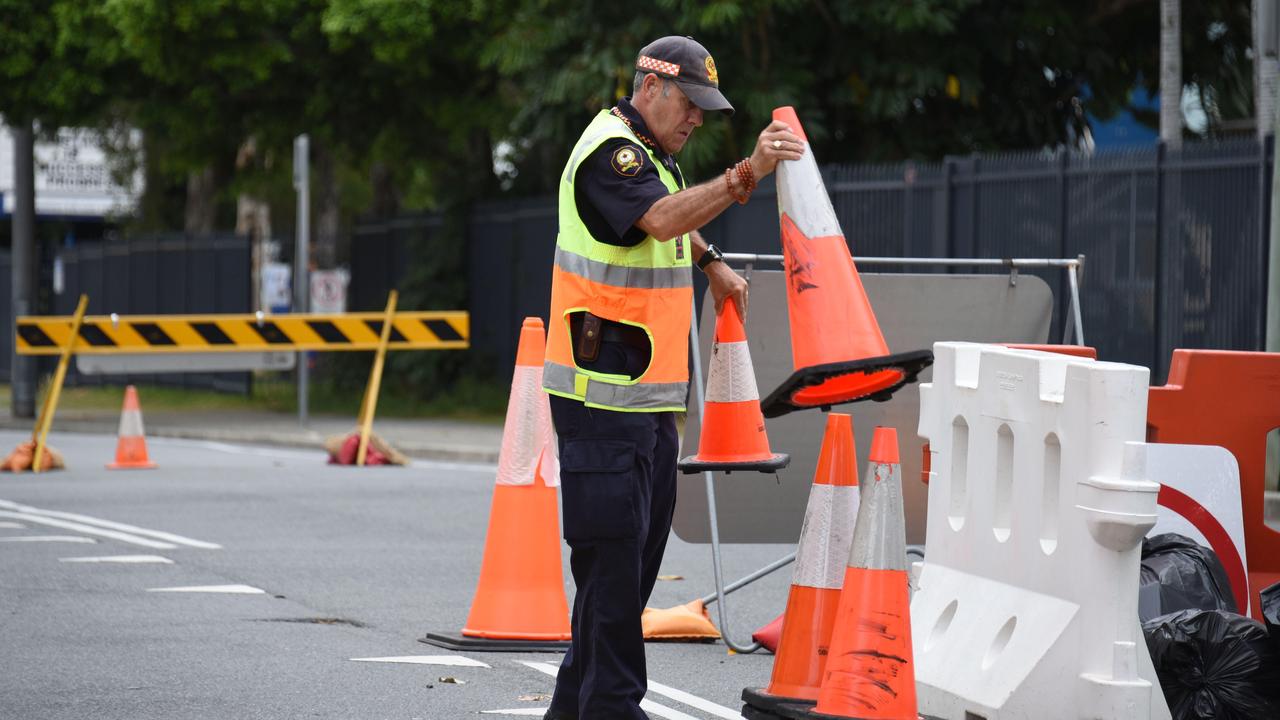 An emergency service worker packs up at the border between NSW and Queensland as it reopens at Griffith Street, Coolangatta. Picture: NCA NewsWire / Steve Holland