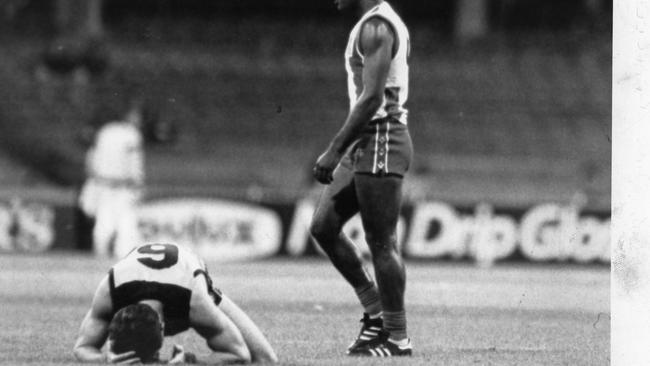 Back in 1987 — North Melbourne’s Jimmy Krakouer (right) and Dale Dickson. Krakouer was reported for allegedly striking Dickson.
