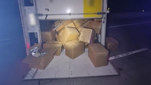 Boxes of allegedly illicit tobacco in a truck that rolled on the Pacific Highway on Sunday morning. Picture: NSW Police