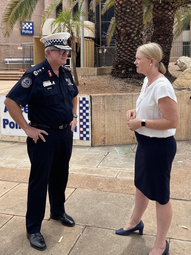 Police Minister Nicole Manison speaks with Police Commissioner Jamie Chalker out the front of Alice Springs police station.