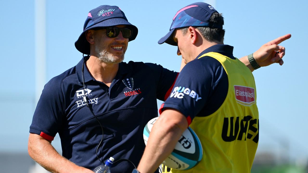 Rebels head coach Kevin Foote (left) says on-field success will be vital for the Rebels to have a hope of a future beyond the 2024 season. Picture: Morgan Hancock / Getty Images