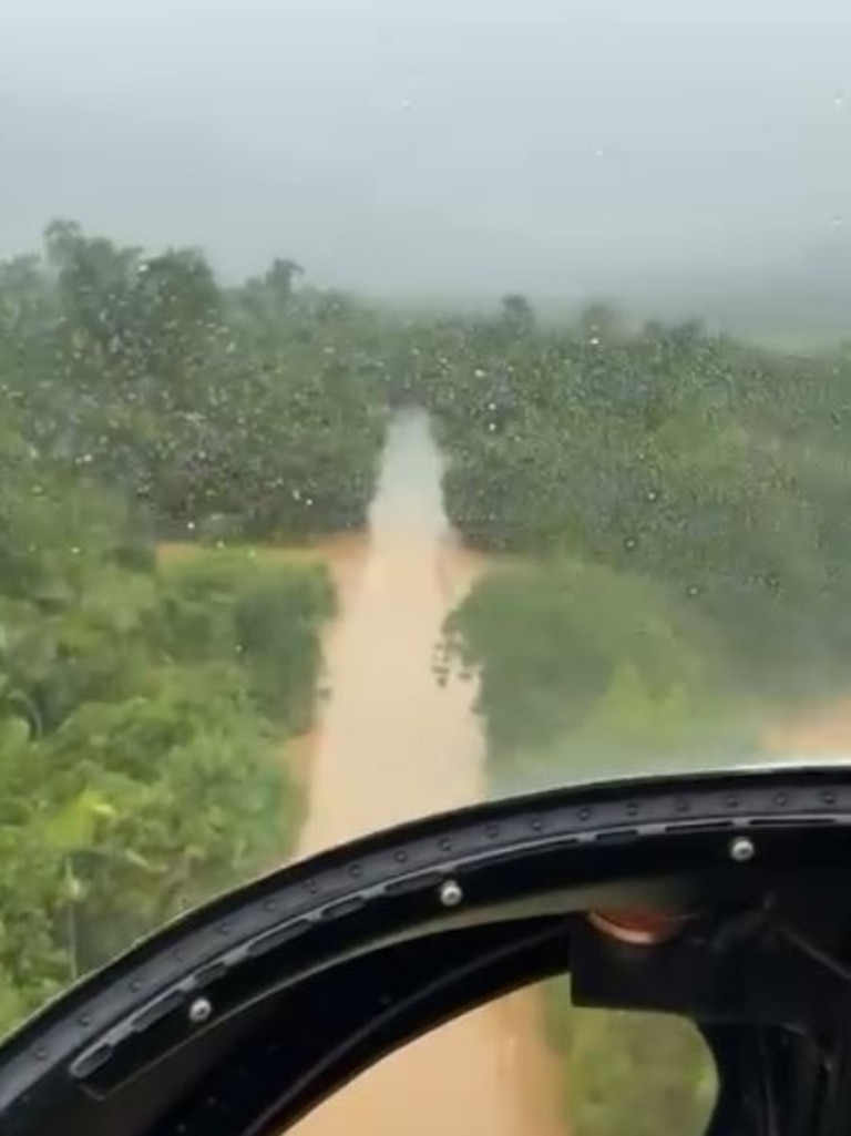 Residents risk it all as floodwaters rise in Far North Queensland. Picture: Facebook.