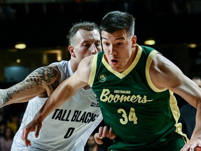 ADELAIDE, AUSTRALIA - MAY 07: Dejan Vasiljevic of the Boomers  competes with  Carlin Davison of the Tall Blacks  during the Trans-Tasman Throwdown match between the Australia Boomers and the New Zealand Tall Blacks at Adelaide Entertainment Centre on May 07, 2025 in Adelaide, Australia. (Photo by Mark Brake/Getty Images)