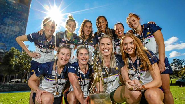 Sunshine Coast Lightning players pose for a photograph their championship trophy in Perth, Monday, August 27, 2018. The Sunshine Coast Lightning beat West Coast Fever to win the 2018 Super Netball competition. Picture: RICHARD WAINWRIGHT