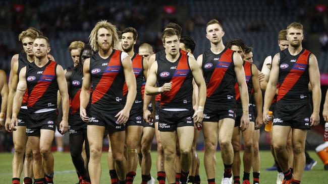 Bombers players trudge off after their loss to St Kilda on Saturday. Picture: Daniel Pockett. 