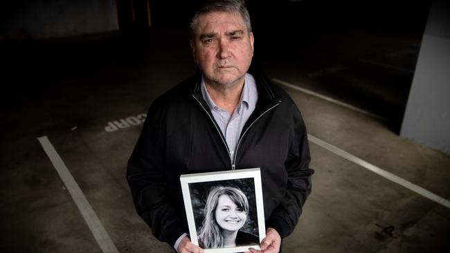 John Herron, the father of Courtney Herron with a picture of his daughter. Picture: Jason Edwards