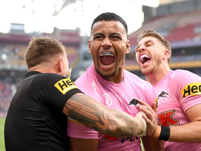 BRISBANE, AUSTRALIA - SEPTEMBER 25: Stephen Crichton of the Panthers celebrates with his team mates after scoring a try during the NRL Preliminary Final match between the Melbourne Storm and the Penrith Panthers at Suncorp Stadium. Picture by Scott Davis /NRL Images