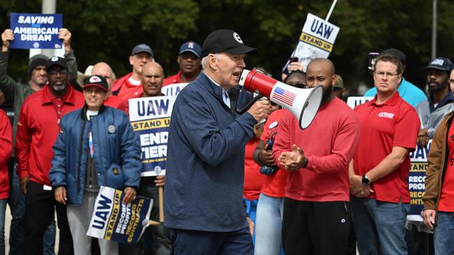 US President Joe Biden becomes the first US president to join a picket line as he addresses striking members of the United Auto Workers union in Michigan. Around 5,600 members of the UAW walked out of 38 parts and distribution centres at General Motors and Stellantis, adding to last week's dramatic US worker walkout. Picture: Jim Watson/AFP