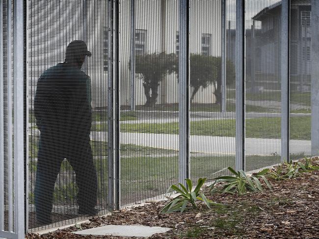 A worker behind the wire at Port Phillip Prison. Picture: David Caird