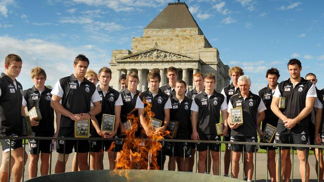 Mick Malthouse with Collingwood’s new recruits visit the Shrine before their Anzac Day clash with Essendon in 2010.