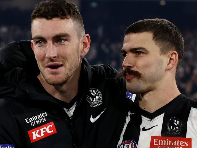 MELBOURNE, AUSTRALIA - September 22, 2023. AFL .   Daniel McStay and Oleg Markov of the Magpies after the 1st preliminary final between Collingwood and the Greater Western Sydney Giants at the MCG in Melbourne, Australia..   Photo by Michael Klein.