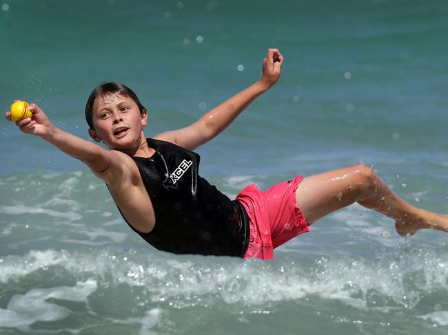 Budinger practices his catching on the Gold Coast beaches in 2012. Picture: Adam Head