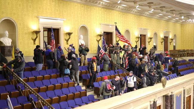 Protesters enter the Senate Chamber, stopping proceedings. Picture: AFP.