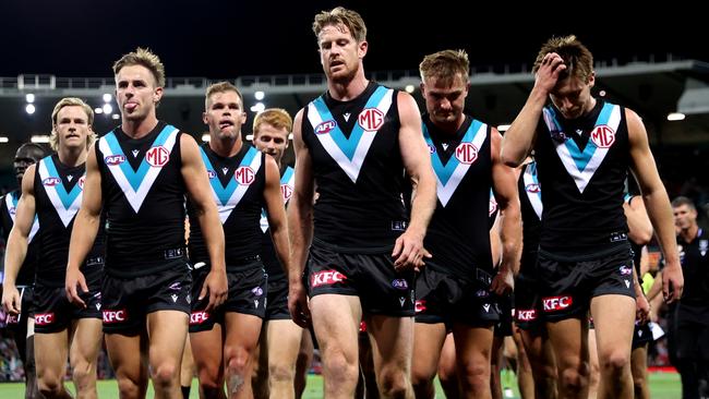 SYDNEY, AUSTRALIA - APRIL 08: Tom Jonas of Port Adelaide leads his team mate off the field at half-time during the round four AFL match between Sydney Swans and Port Adelaide Power at Sydney Cricket Ground, on April 08, 2023, in Sydney, Australia. (Photo by Brendon Thorne/AFL Photos/via Getty Images )