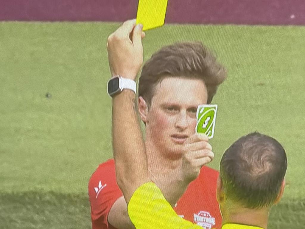 Comedian Max Fosh produces an Uno reverse card in response to being booked in a charity match.