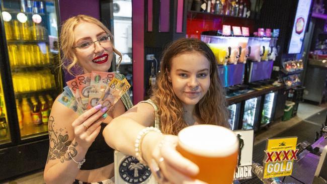 Monsoons duty manager Amber Amphlett and bartender Sarah Unsworth are happy to be rewarded for their hard work on a day most people rest. Picture: Floss Adams.