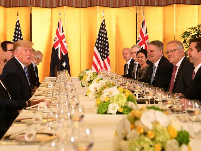 Australian Prime Minister Scott Morrison and President of the United States of America Donald Trump speak during a working dinner ahead of the official start of the G20 summit in Osaka, Japan, Thursday, June 27, 2019. The leaders of the world's largest economies arrive in Osaka from Thursday for the fourteenth meeting of Group of Twenty (G20). (AAP Image/Lukas Coch) NO ARCHIVING