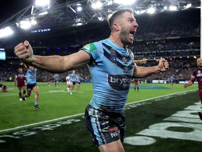 NSW's James Tedesco celebrates winning try with Mitchell Pearce during Game 3 of the State of Origin series between NSW Blues and Queensland at ANZ Stadium, July 10, 2019. Picture. Phil Hillyard