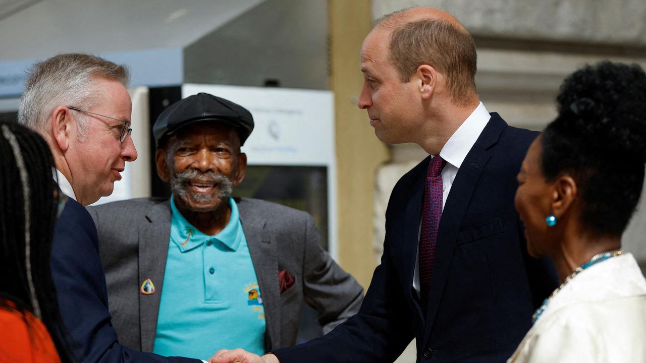 Prince William, Duke of Cambridge, shakes hands with Britain's Housing and Levelling Up Secretary Michael Gove (L) next to Windrush passenger Alford Gardner (C) and Baroness Floella Benjamin (R) before the unveiling of the National Windrush Monument. Picture: AFP