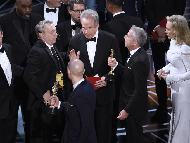 Chaos on the Oscars stage after Warren Beatty and Faye Dunaway announced the wrong Best Picture winner. Picture: AP