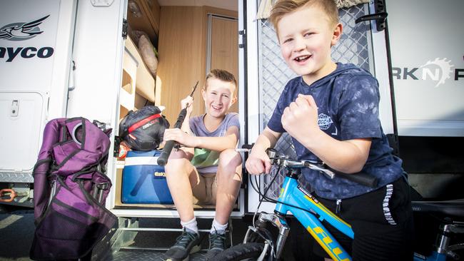 Brothers Max, 9 and Mitch Tew, 8 are excited to be heading to their shack this weekend as COVID-19 restrictions ease in Tasmania. Picture: LUKE BOWDEN