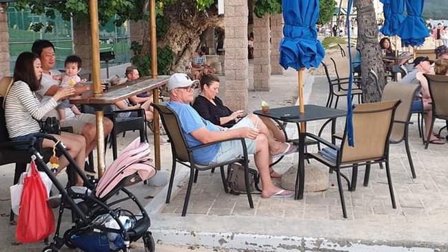 The PM with wife Jenny spotted yesterday at a bar in Hawaii.