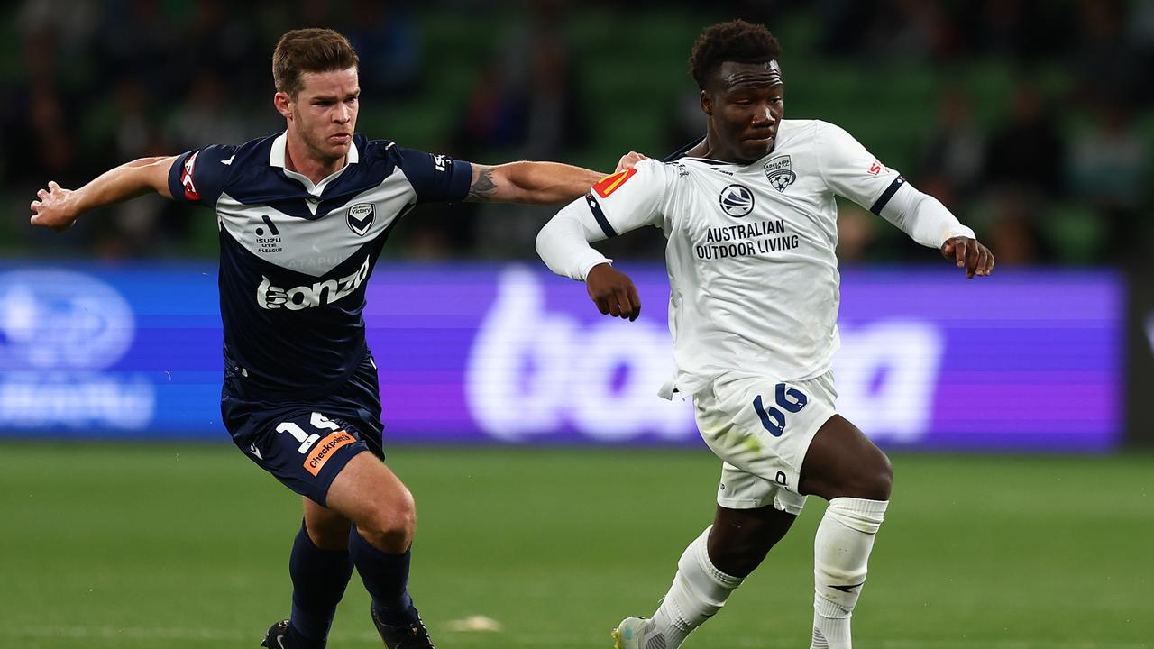Connor Chapman (left) could again match up with Adelaide United star Nestory Irankunda after his rough treatment upset the teenager in the previous clash. Picture: Graham Denholm / Getty Images