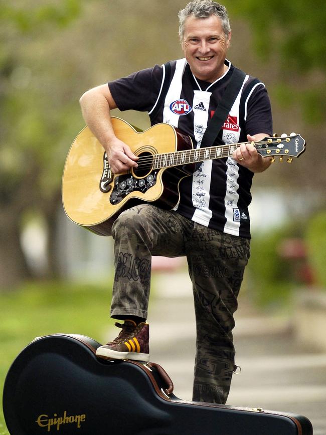 Musician Ross Wilson sports a signed Magpies jumper — the Pies will be hoping there’s no Eagle Rock on the weekend.