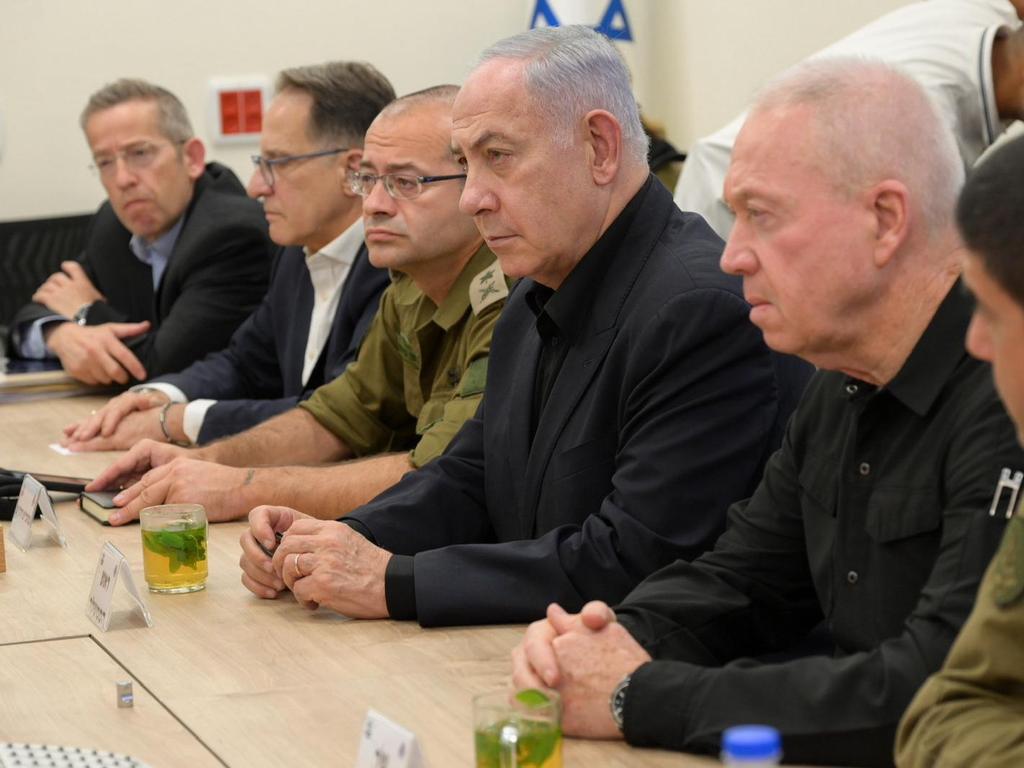 Israeli Prime Minister Benjamin Netanyahu with Defence Minister Yoav Gallant and others at military headquarters in Tel Aviv. Picture: Maayan Toaf/Defence Ministry