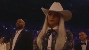 Beyonce watches her husband call out the Grammys on her behalf.