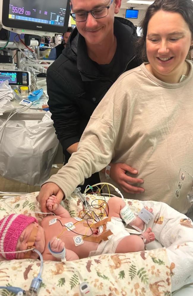 Little baby Scarlett with her parents at the Mater Brisbane. Pictures: Peter Wallis