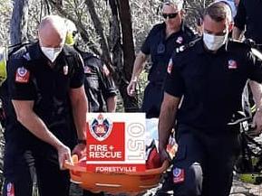 NSW Fire and Rescue; NSW Ambulance, and its Special Operations Team  and; police, including a Water Police launch, were involved in the rescue of a woman, 57, who fell and hurt her leg while walking in the Garigal National Park at Killarney Heights on Sunday, August 16, 2020.  Picture: NSW Fire and Rescue