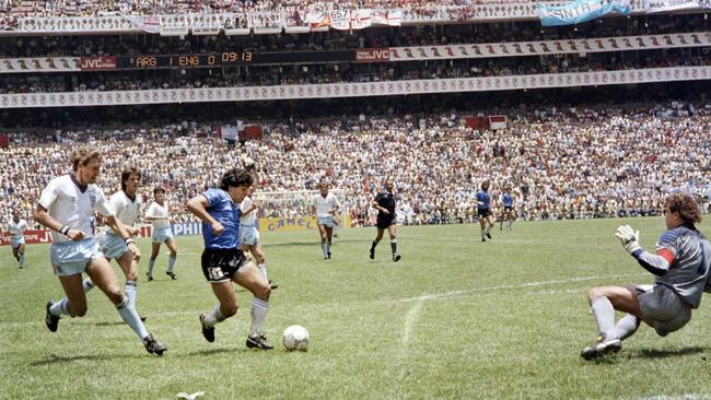 Maradona scores arguably football’s greatest ever goal after the Hand of God controversy. Picture: AFP