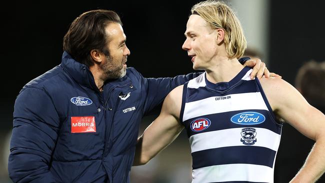 Scott celebrating victory with Zach Guthrie at full-time. (Photo by Mark Kolbe/Getty Images)