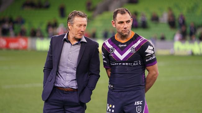 Craig Bellamy, coach of the Melbourne Storm and Cameron Smith talk during the Round 25 NRL match between the Melbourne Storm and the North Queensland Cowboys at AAMI Park in Melbourne, Friday, September 6, 2019. (AAP Image/Scott Barbour) NO ARCHIVING, EDITORIAL USE ONLY