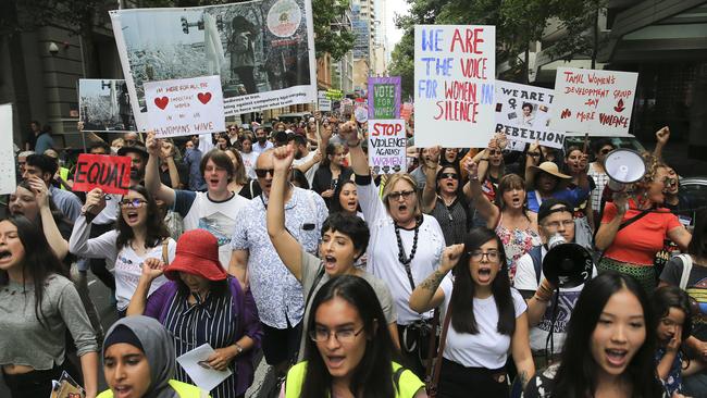 Thousands of people marched from Hyde Park to Belmore Park to raise awareness on domestic violence. Picture: Dylan Robinson