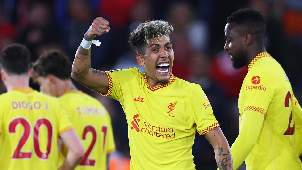 SOUTHAMPTON, ENGLAND - MAY 17: Roberto Firmino of Liverpool celebrates after Joel Matip (not pictured) scores their sides second goal during the Premier League match between Southampton and Liverpool at St Mary's Stadium on May 17, 2022 in Southampton, England. (Photo by Clive Rose/Getty Images)