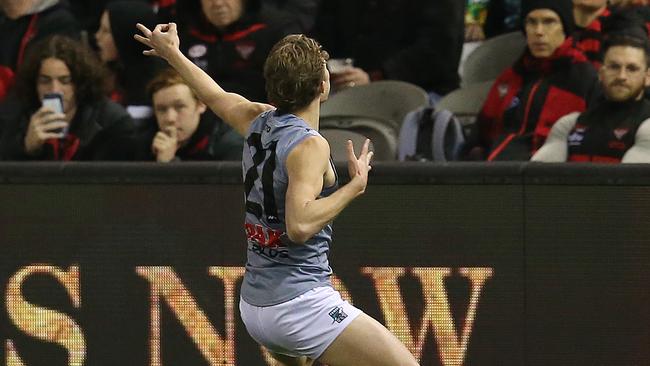 Xavier Duursma of the Power celebrates a goal in the third quarter with the bow and arrow. Picture: Michael Klein