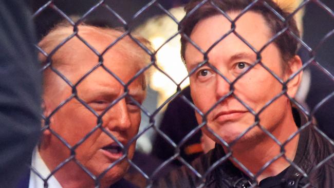 (FILES) US President-elect Donald Trump (L) and Tesla and SpaceX CEO Elon Musk watch a fight during UFC 309 at Madison Square Garden in New York, on November 16, 2024. The US House of Representatives on December 19, 2024 overwhelmingly rejected a Republican-led funding bill aimed at averting a government shutdown, with federal agencies due to run out of cash on Friday night and cease operations starting this weekend. Several political allies of Trump were also in attendance including entrepreneurs Elon Musk and Vivek Ramaswamy, who have been asked by Trump to lead efforts to cut government inefficiency. (Photo by Kena Betancur / AFP)