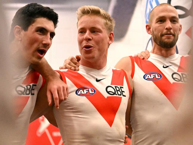 MELBOURNE, AUSTRALIA - AUGUST 21: Isaac Heeney of the Swans sings the song following the round 23 AFL match between the St Kilda Saints and the Sydney Swans at Marvel Stadium on August 21, 2022 in Melbourne, Australia. (Photo by Morgan Hancock/AFL Photos/via Getty Images)