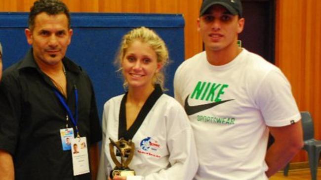 Cassie with her two coaches after medalling at one of the many Olympic selection competitions for the London Olympics.