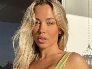 Fitness star flaunts booty in nude bike shorts