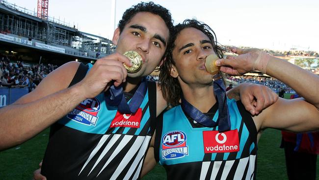 Shaun Burgoyne and Peter Burgoyne of the Power celebrate their Grand Final win. Picture: Ryan Pierse/Getty